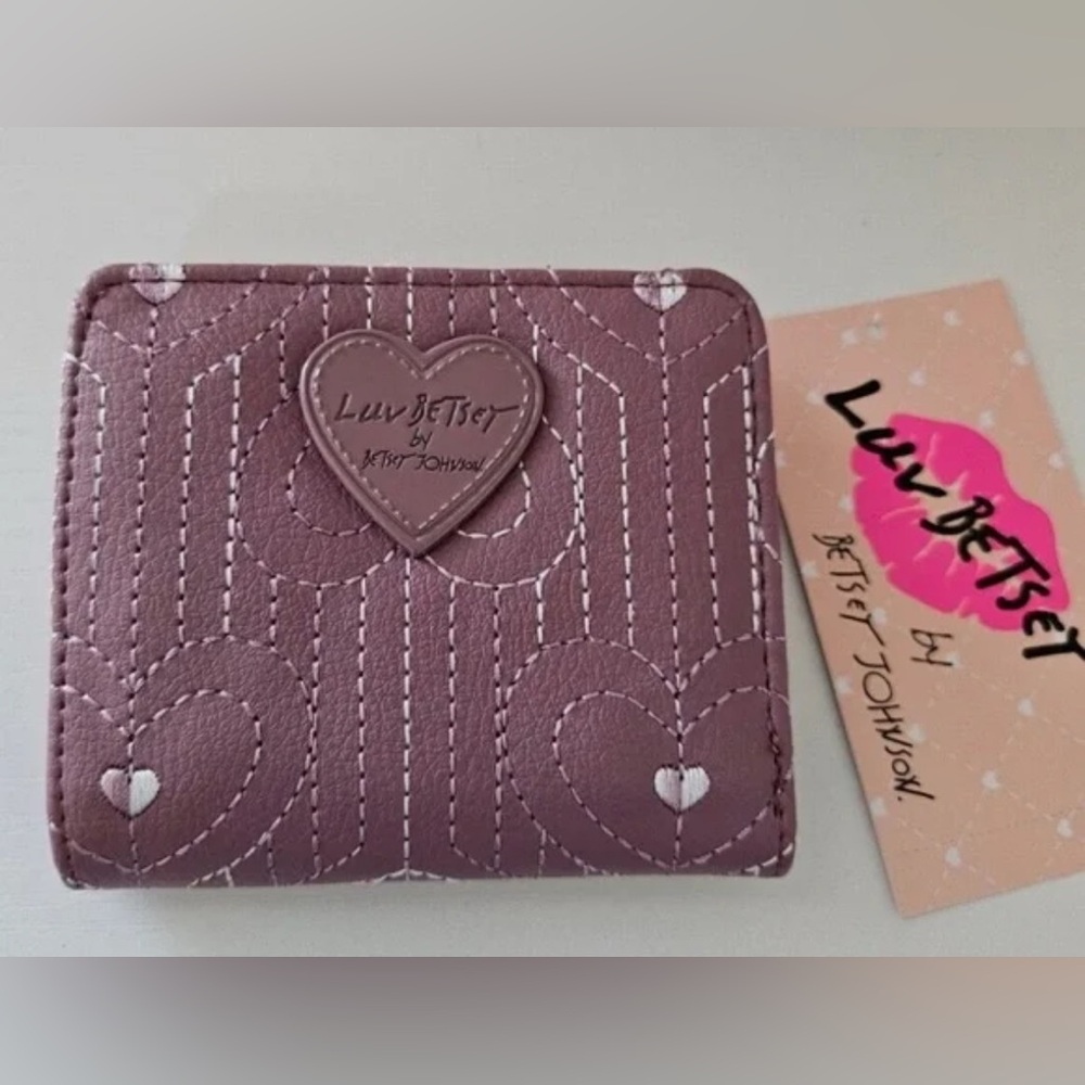 NWOT Betsy Johnson Mauve Wallet with Heart Design.